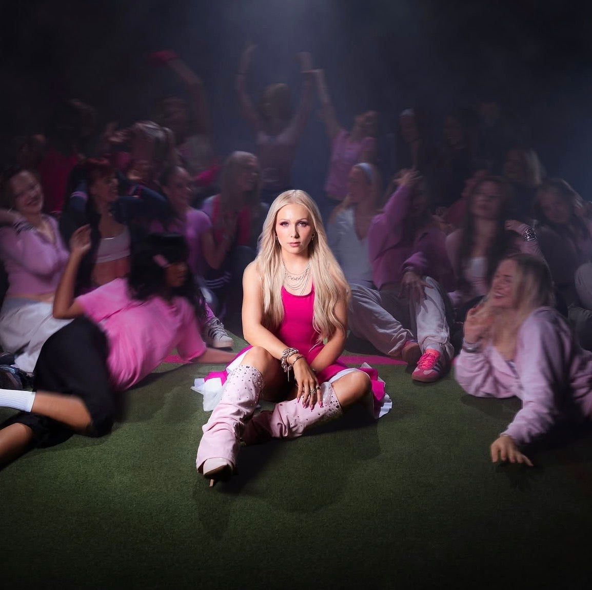 VIIVI wearing pink Denim Heights boots in the Herkkisten liiga album campaign photo